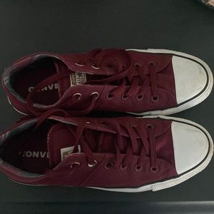 Maroon Converse chucks.